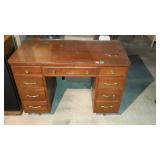 Glass top knee hole desk, with 9 drawers measures
