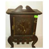Wooden clock is missing cover, measures 18 inches