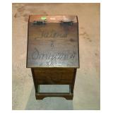 Storage box that has taters and onions on it