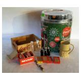 Coca-Cola collectibles, popcorn tin with trucks,