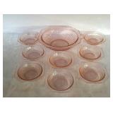 Pink depression glass serving bowl with 8 berry
