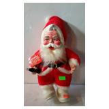 Older stuffed Coca-Cola Santa figure with real