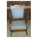 Wood frame spring rocker, upholstered to match