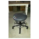Swivel stool on wheels, 18" across and 20" tall.