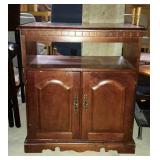 Cherry finish media cabinet, swivel top, under