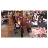 Dining table with two 22" leaves and six chairs -