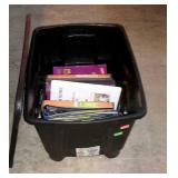 Black tote, full of note pads and binders