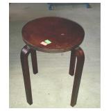 Round wooden occasional table or plant stand.