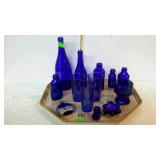 Cobalt blue glass group, bottles, glasses,