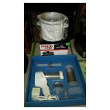 Cookie press and small slow cooker. Both in