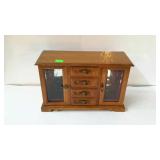 Jewelry box, four drawers and two doors.
