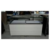 Display show case glass has a crack in it on it