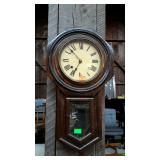 Pendulum clock with three clock keys. Wooden