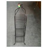 Metal home decor rack, measures 34 inches tall