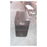 Wooden storage cabinet, measures 24 inches long,