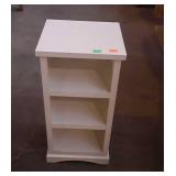 Small wooden shelf, measures 26 inches tall