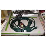Two extension cords - one is heavy duty