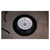 Tire with 5-lug rim, Carlisle Sport Trail LH,
