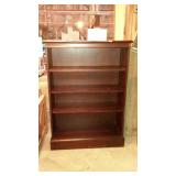 Dark finish office style bookcase. Three shelves