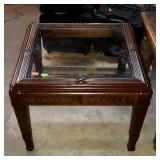 Single beveled glass top end table with carved