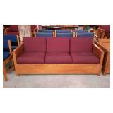 Wood framed, six cushion sofa in This End Up