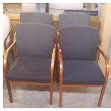 Set of four blue armed office chairs