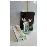 Wine book, perfect pourer, and deer head stopper