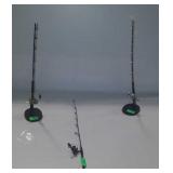 Three miniature fishing poles, two have holders