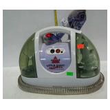 Bissell Proheat carpet cleaner with attachments.