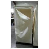 Portable clothing closet. Metal frame with