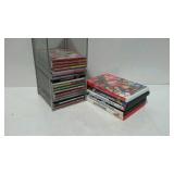 Group of computer games and five DVDs.