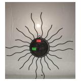 Metal sun wall hanging measures approximately 20