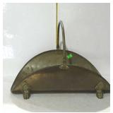 Brass log holder with paw feet