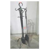 Wrought iron fireplace tools, twisted handles,