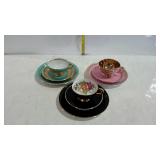 German painted china, three sets- cup, saucer, and