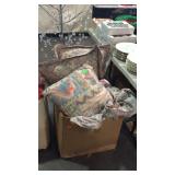 Box of pillows and sheets