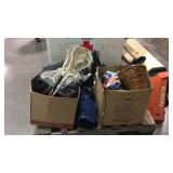 Skid lot with lacrosse equipment, foot stool,