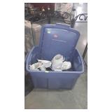 Blue tote with lid and ski boots