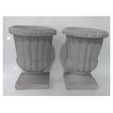 Two faux concrete small artificial Christmas tree