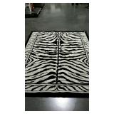 Zebra design area rug, black border zebra pattern
