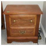 Broyhill two drawer night stand with carved acorn