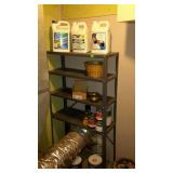 Metal shelf, paints, small brass spittoon, light