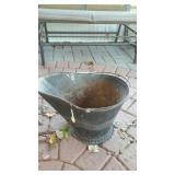 Coal bucket, located on back patio