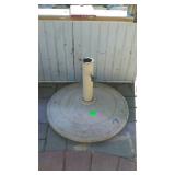 Umbrella stand, located on back patio