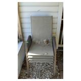 Set of four patio chairs, located on back patio