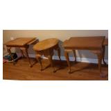 Set of three end tables, located in down stairs