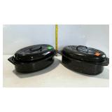 Two enamelware roasting pans with lids