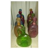 Colored glass bottles, eight Ezra Brooks brand