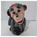 Monkey shaped, chalk coin bank missing stopper