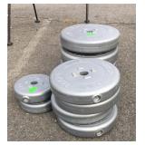 Group of Weights:  two 5 pound weights, four 10